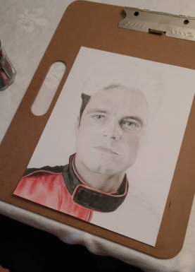 Screenshot_2023-04-19_21-44-48 half-finished colored pencil drawing of a man in a red jacket