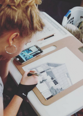 elleinadrawing Photo of Elleina drawing a building